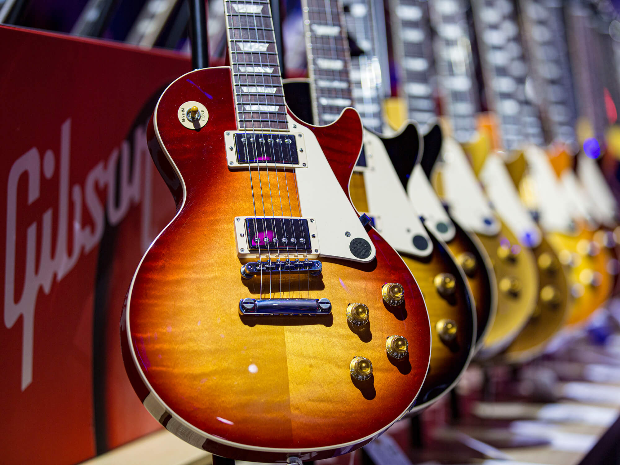 Several Gibson Guitars in a row