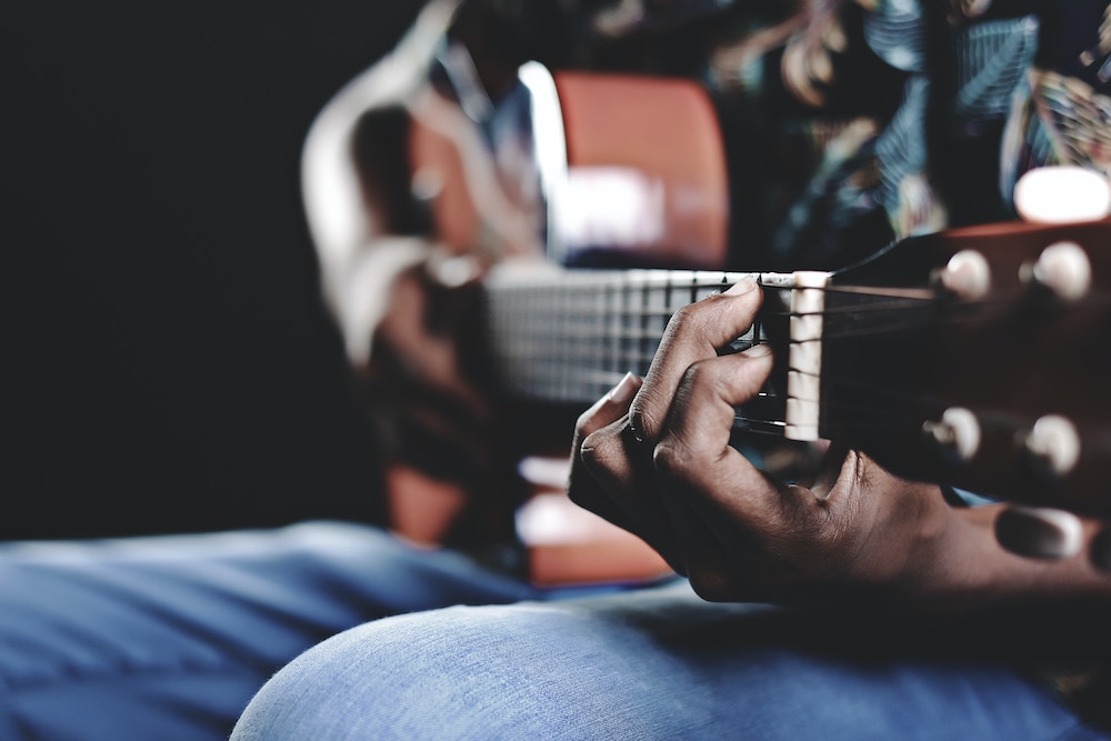 Student playing guitar